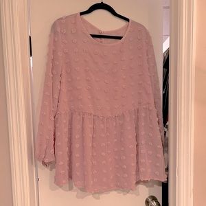 Pink dotted baby doll style blouse.